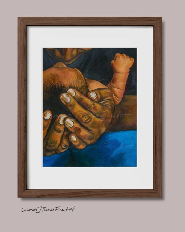 Father Holding Baby with Fist